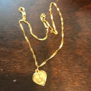 Yellow gold necklace with heart pendent